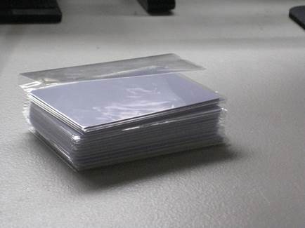 A stack of white cards in a plastic bag

AI-generated content may be incorrect.